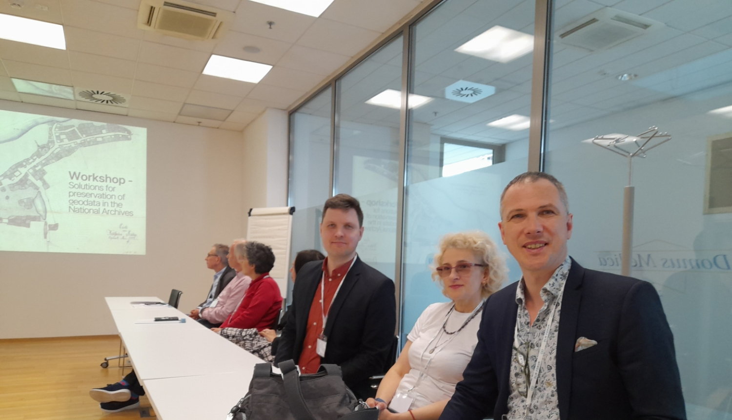 Krāsaina bilde, Gatis Karlsons un Mārtiņš Krastiņš pārstāv LNA Ģeodatu arhivēšanas konferencē